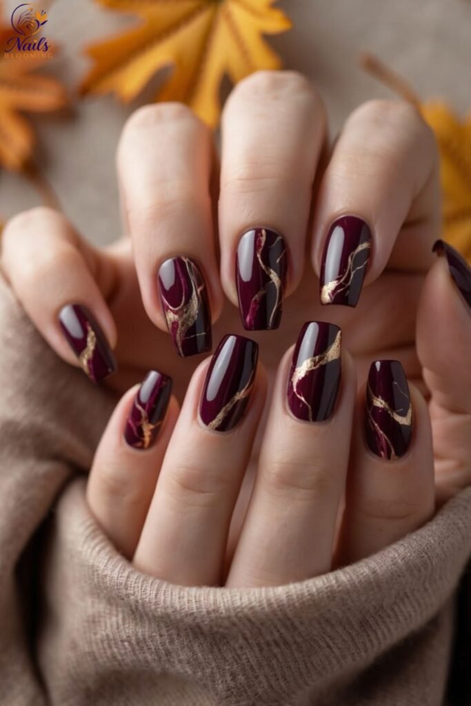 Dark Fall Nails with Subtle Marble Veining